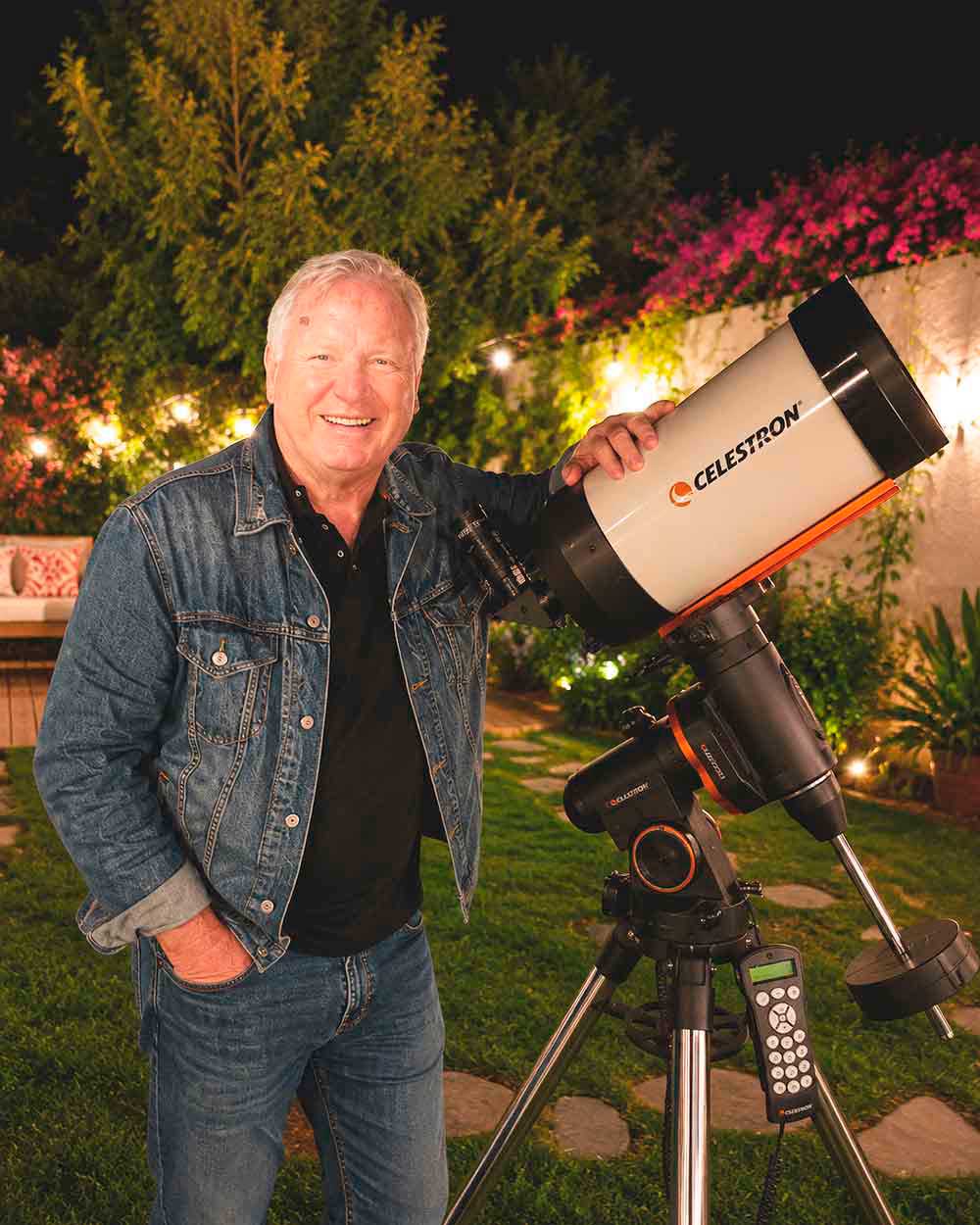 Dan Aug amateur astronomer with Celestron telescope